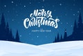 Handwritten elegant lettering of Merry Christmas on blue night winter background Royalty Free Stock Photo
