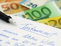 Handwritten german testament, last will with fountain pen and euro banknotes on background Royalty Free Stock Photo