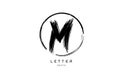 handwritten grunge M brush stroke letter alphabet logo icon design template in black and white for business