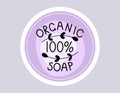 Handwritten lettering text Organic Soap One Hundred Percent. Vector isolated purple round sticker or label for packaging Royalty Free Stock Photo