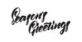 Handwritten modern brush lettering of Seasons Greetings isolated on white background. Royalty Free Stock Photo