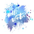 Handwritten modern lettering Hello Winter on watercolor imitation blue background. Royalty Free Stock Photo