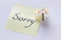 Handwritten note - Sorry. Small delicate white flowers of almon