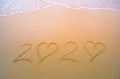 2020 handwritten numeric text on the sand by the beach, Numbers 2020 year on the sand, Happy New Year 2020, Zeros represented by