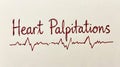 Heart Palpitations Text with ECG Line - Medical Concept Royalty Free Stock Photo