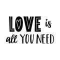 The handwritten phrase Love is all you need. Hand lettering. Words on the theme of Valentine`s Day. Black and white vector