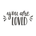 The handwritten phrase You are loved. Hand lettering. Words on the theme of Valentine's Day. Black and white vector