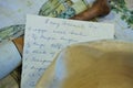 Handwritten pie recipe with dishtowel and antique mortar pestle