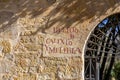 Handwritten sign on the wall in Salamanca in traditional style