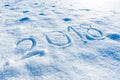 2018 handwritten on the snow