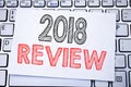 Handwritten text caption showing 2018 Review. Business concept writing for Feedback On Progress written on sticky note paper on th