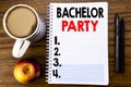 Handwritten text showing Bachelor Party. Business concept for Stag Fun Celebrate written on notepad note paper on the wood structu