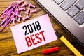 Handwritten text showing 2018 Best. Business concept for Choice Review written on pink sticky note paper on the wooden background Royalty Free Stock Photo