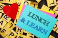 Handwritten text showing Lunch And Learn. Conceptual photo Presentation Training Board Course written on colorful sticky note on t
