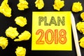 Handwritten text showing Plan 2018. Business concept writing for Planning Strategy Action Plan written on sticky note paper on the