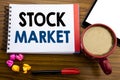 Handwritten text showing Stock Market. Business concept writing Equity Share Exchange Written on notepad note paper, old black woo Royalty Free Stock Photo