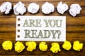 Handwritten text showing Are You Ready. Business concept for Future Preparation Plan Written on sticky note, wooden with sticky, m