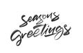 Handwritten textured brush lettering of Seasons Greetings on white background Royalty Free Stock Photo