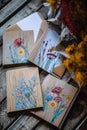 handwritten thank you notes on a wooden background