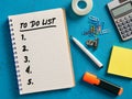 Handwritten to do list on a notebook