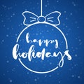 Handwritten type lettering composition of Happy Holidays in Christmas Ball on blue snowflakes background. Royalty Free Stock Photo
