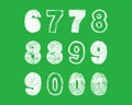 Handwritten white chalk bold arabic numbers on green background Royalty Free Stock Photo