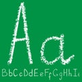 Handwritten white chalk letter with transparent layers on green background