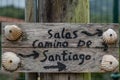 Signpost Camino de Santiago with four shells