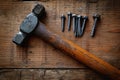 Handy work hammer and nails, top view with copy space Royalty Free Stock Photo
