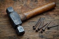 Handy work hammer and nails, top view with copy space Royalty Free Stock Photo