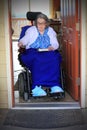 Handyicapped woman riding in wheelchair