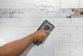 Handyman Applying Ceramic Tile Grout Royalty Free Stock Photo