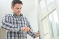 Handyman fitting new door Royalty Free Stock Photo