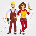 Handyman and handywoman holding drills