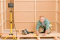 Handyman home improvement wooden floor renovation Royalty Free Stock Photo