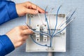 Handyman installs circuit breakers for home wiring Royalty Free Stock Photo