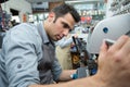 Handyman making door keys copies Royalty Free Stock Photo