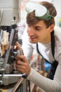 Handyman making door keys copies Royalty Free Stock Photo