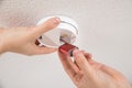 Handyman Repairing Smoke Detector Royalty Free Stock Photo