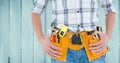 Handyman with tool belt at home Royalty Free Stock Photo