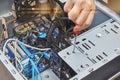 Repairman is installing HDD of desktop computer Royalty Free Stock Photo