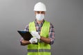 Handyman worker checking the list on the clipboard Royalty Free Stock Photo