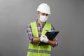 Handyman worker checking the list on the clipboard Royalty Free Stock Photo