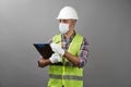 Handyman worker checking the list on the clipboard Royalty Free Stock Photo