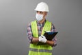 Handyman worker checking the list on the clipboard Royalty Free Stock Photo