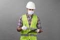 Handyman worker checking the list on the clipboard Royalty Free Stock Photo