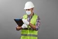 Handyman worker checking the list on the clipboard Royalty Free Stock Photo