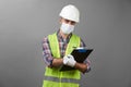 Handyman worker checking the list on the clipboard Royalty Free Stock Photo