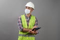 Handyman worker checking the list on the clipboard Royalty Free Stock Photo