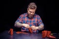 Leather workman creates quality product of leather in his shop Royalty Free Stock Photo